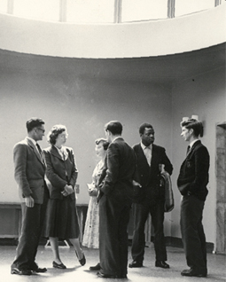 Students gather in the new main-side entrance at Queen Mary College, c1934.